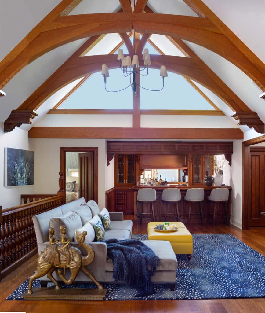 Second floor TV room with home bar and vaulted, beamed ceiling