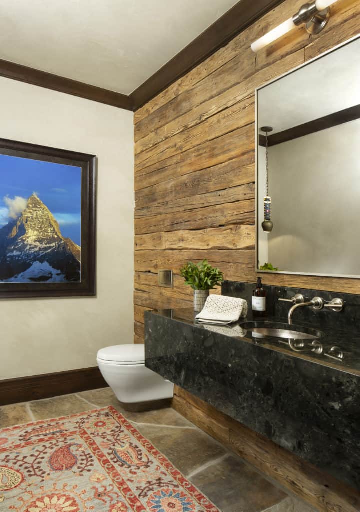 Rustic powder room with hanging sink from colorado home renovation