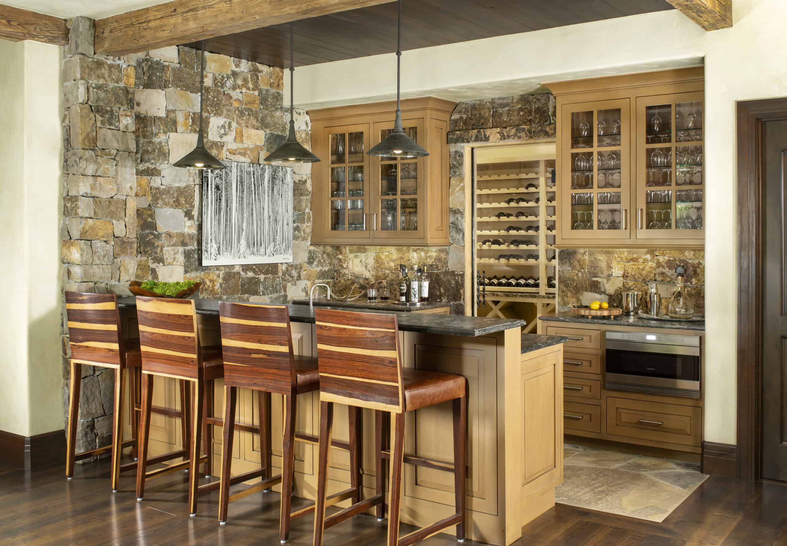 Rustic home bar with wood and stone accents
