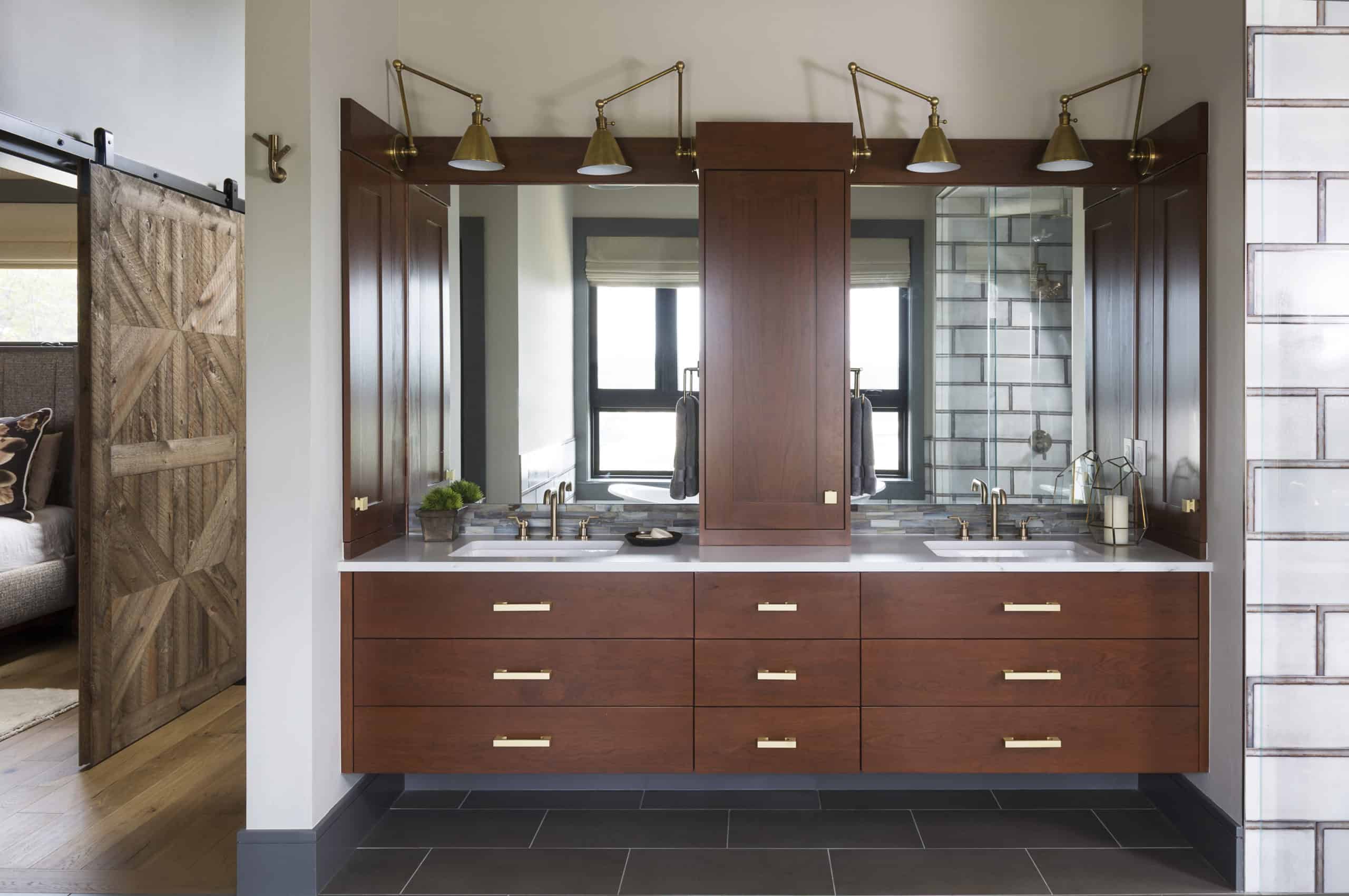 Double vanity dresser and adjustable sconces in master bath