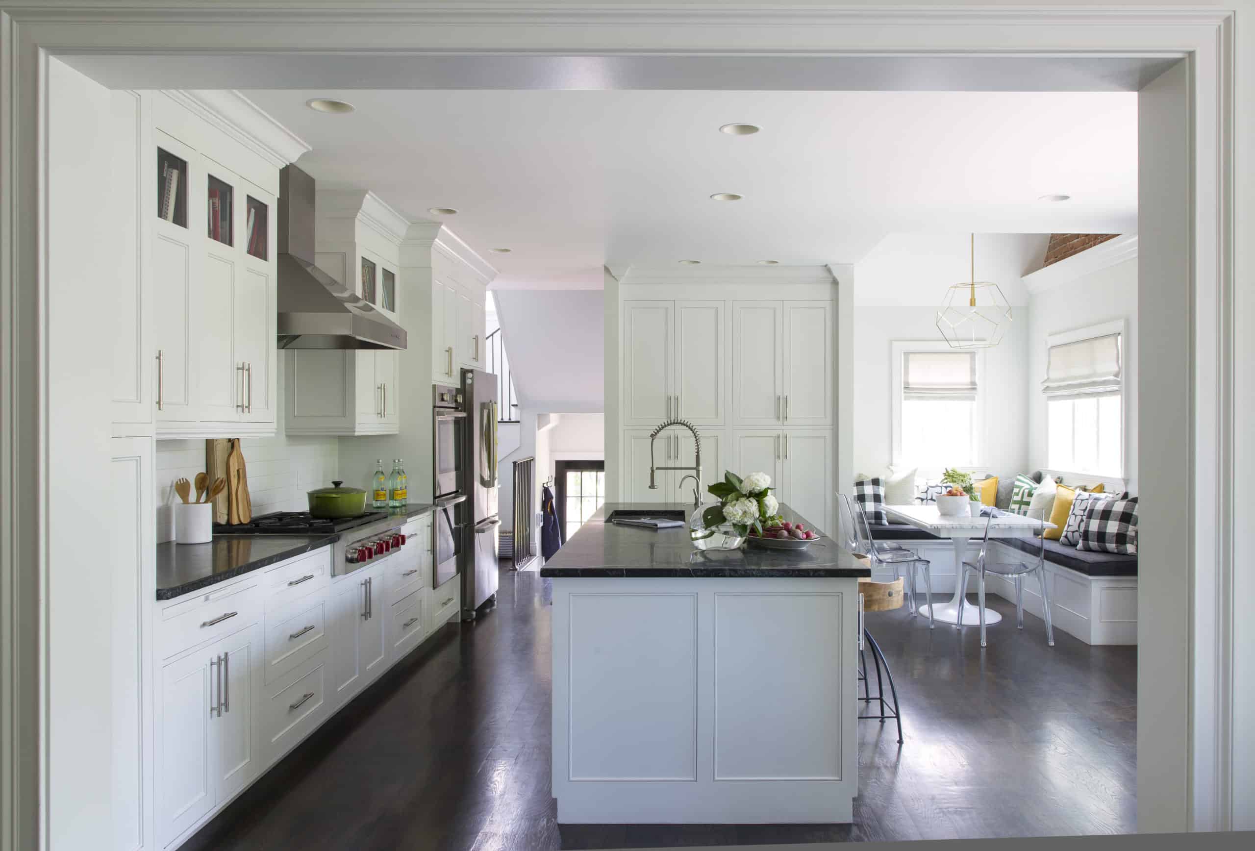 Crisp Classic Interiors with large kitchen renovation with breakfast nook
