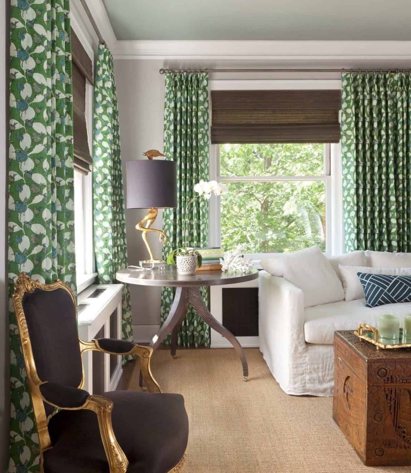 Green drapes and bird lamp add stimulate living area - Andrea Schumacher Interiors