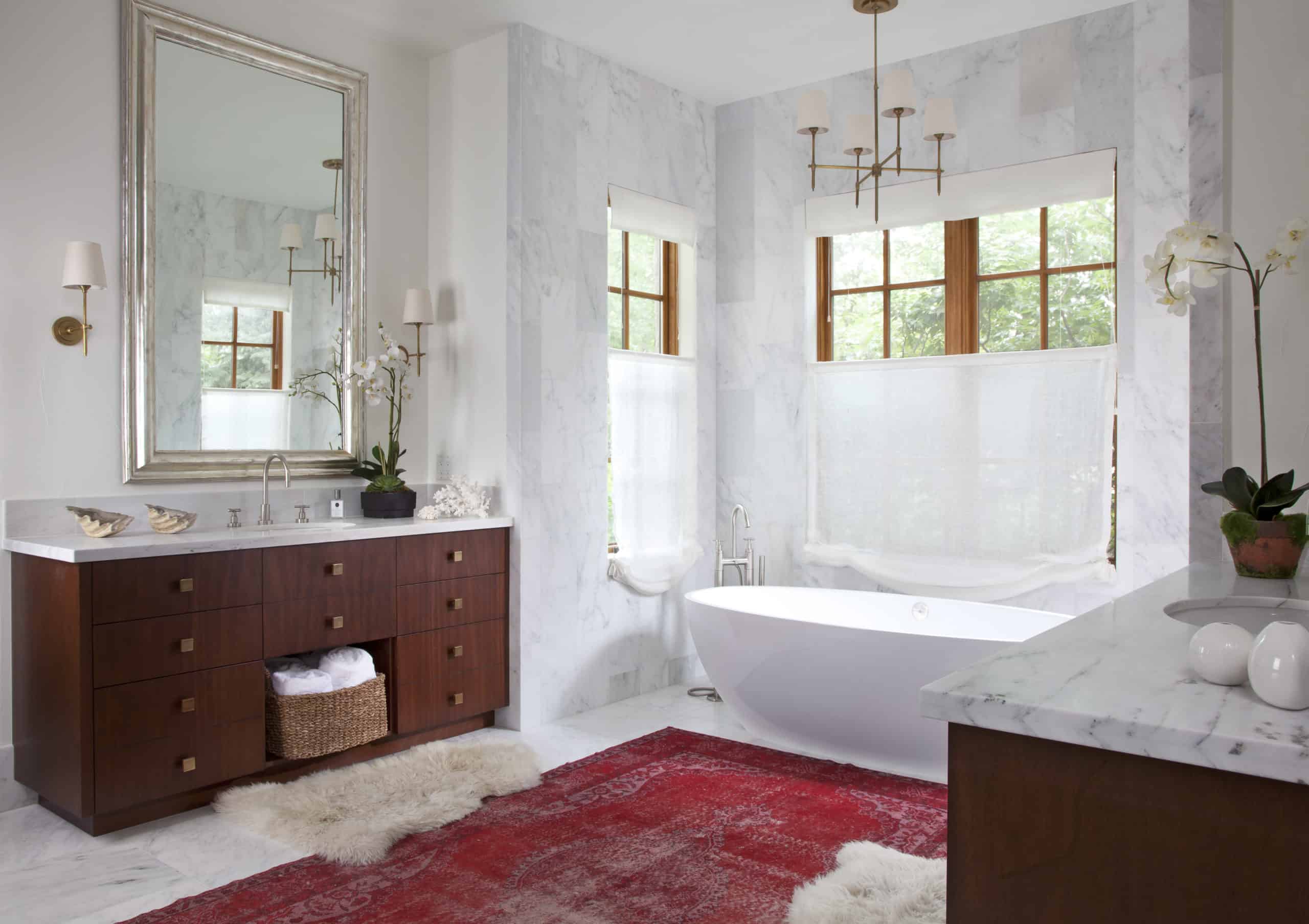 Luxury Bathroom Renovation with Two Vanities and Red Accent Rug