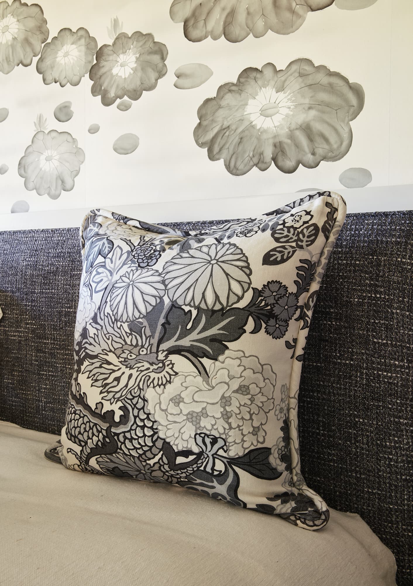 Gray and white dragon pillow designed by Denver interior decorator