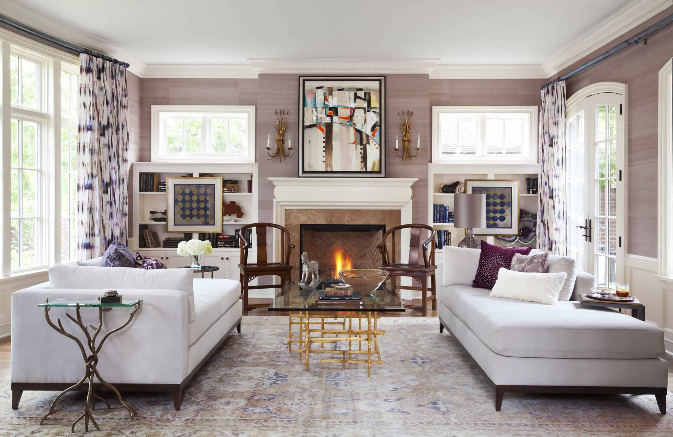 Curated living room with matching custom chaise lounge chairs and curated art