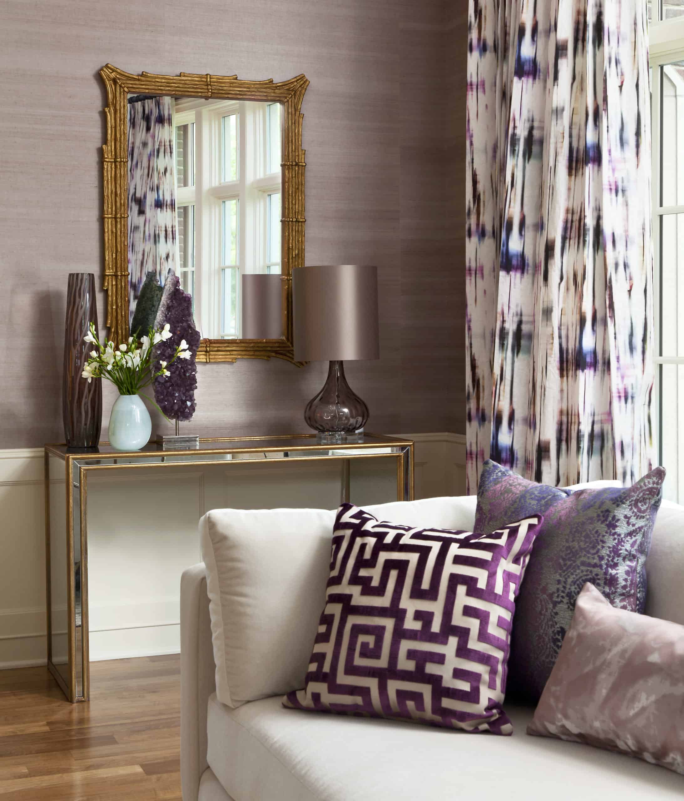 Cream and purple living room with metal accent decor