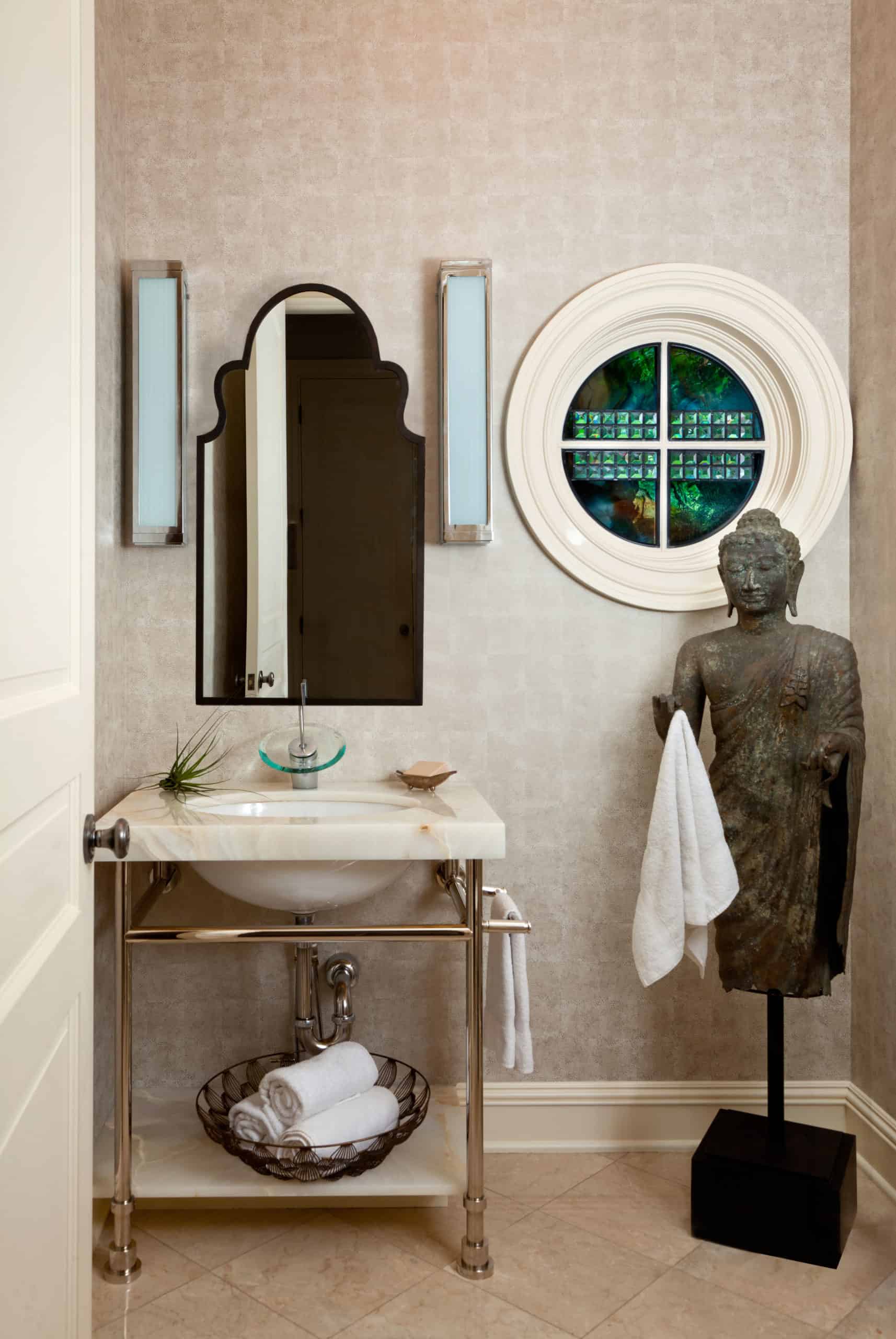 Powder room in neutrals and unique decor