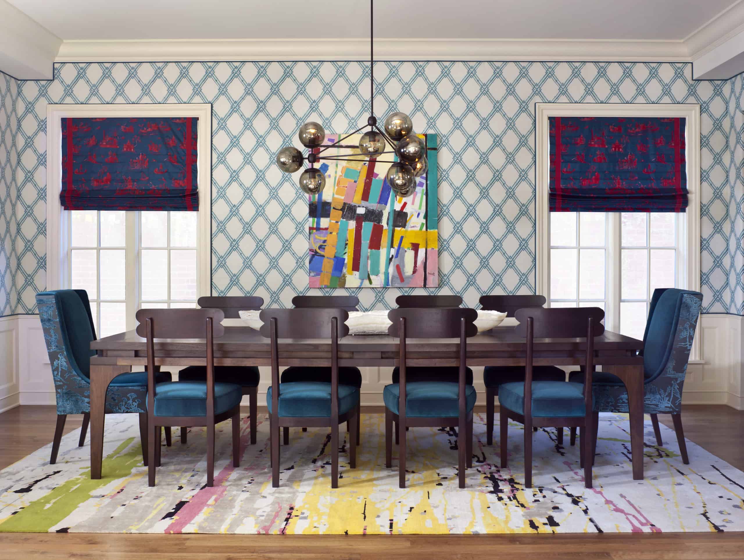 Colorful dining room decor in bright colors and artistic interior design style with paint splash rug