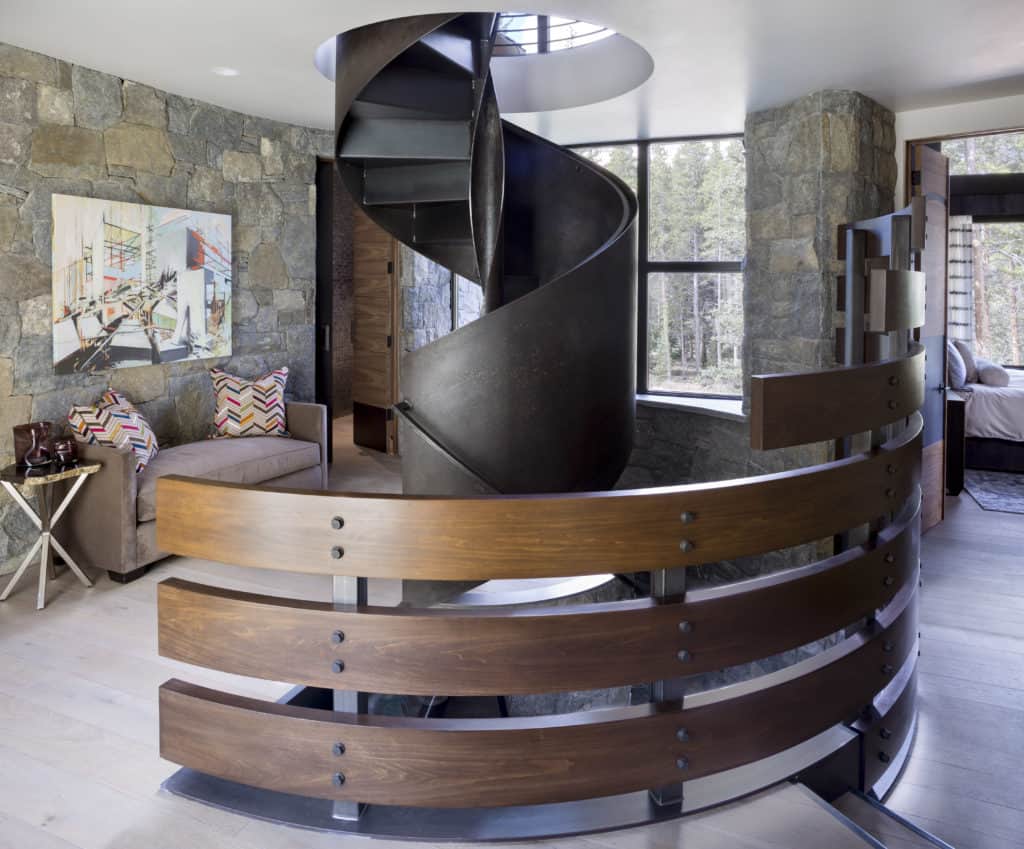 Wooden spiral staircase in Colorado residence