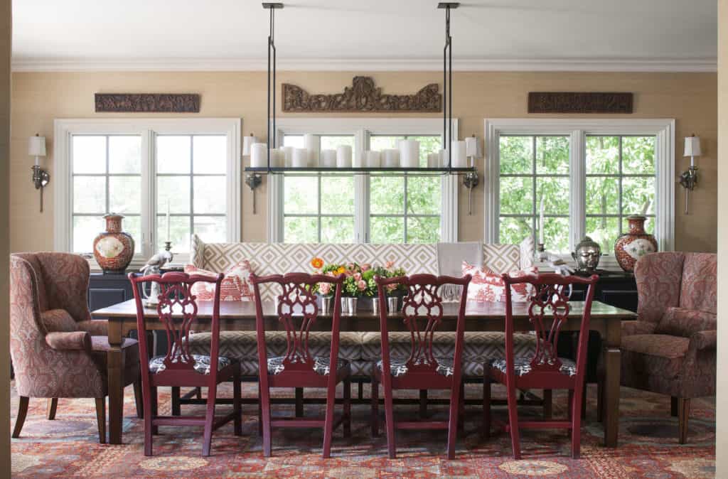 Collected Beauty large dining table with arm chairs and bench in Colorado home redesign
