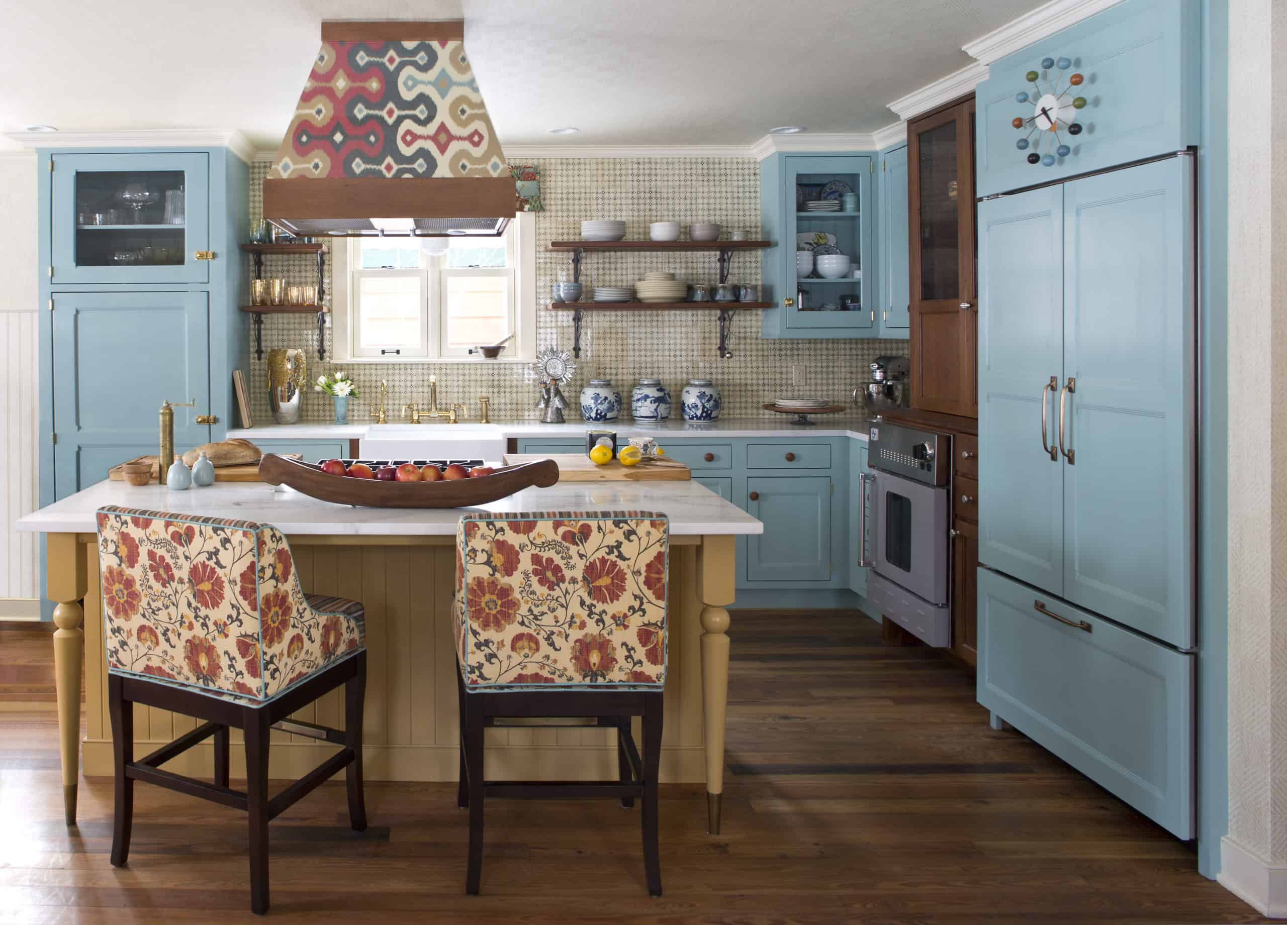 Colorful kitchen design with light turquoise blue cabinets
