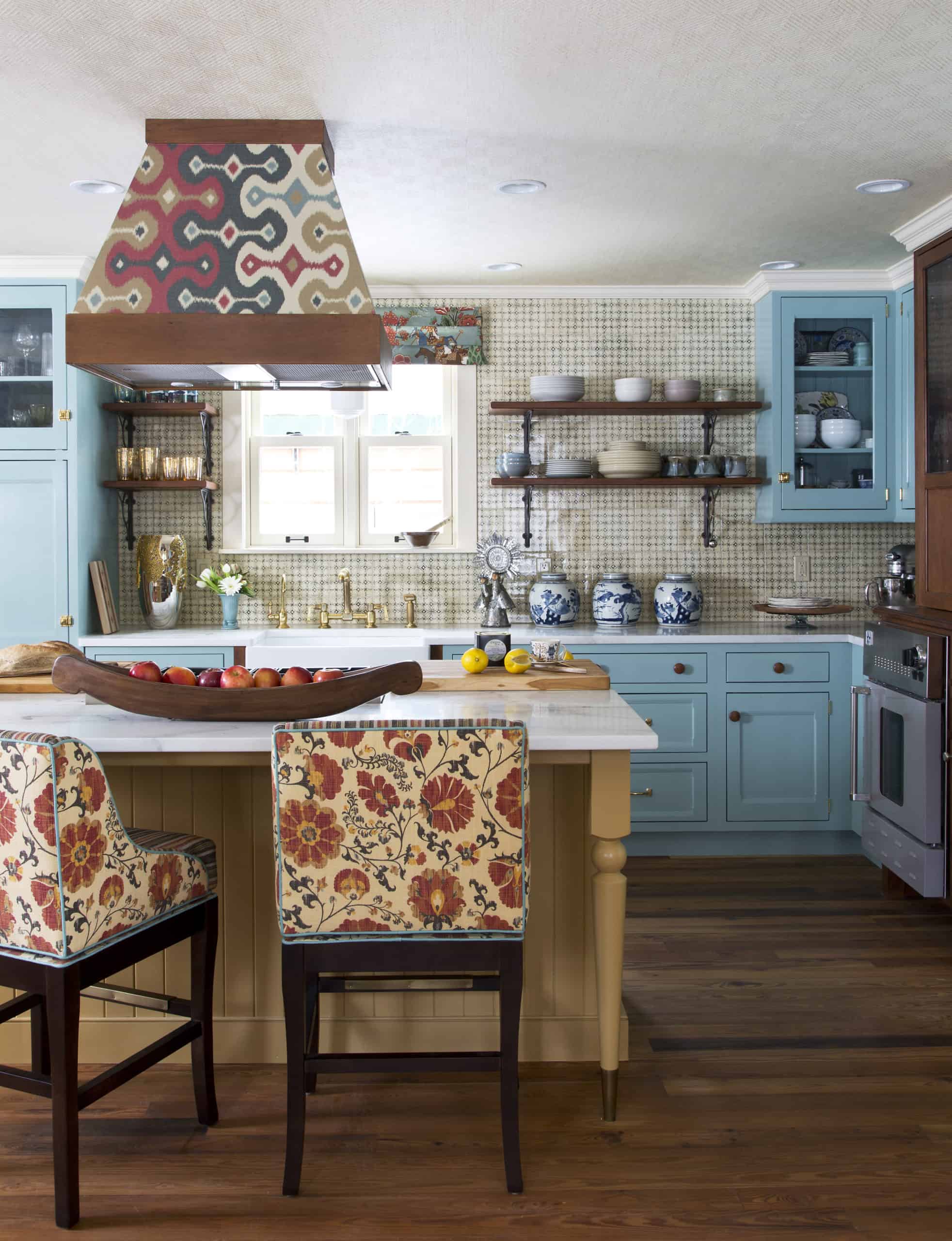 Wallpapered stove hood, open kitchen shelving in rustic contemporary kitchen