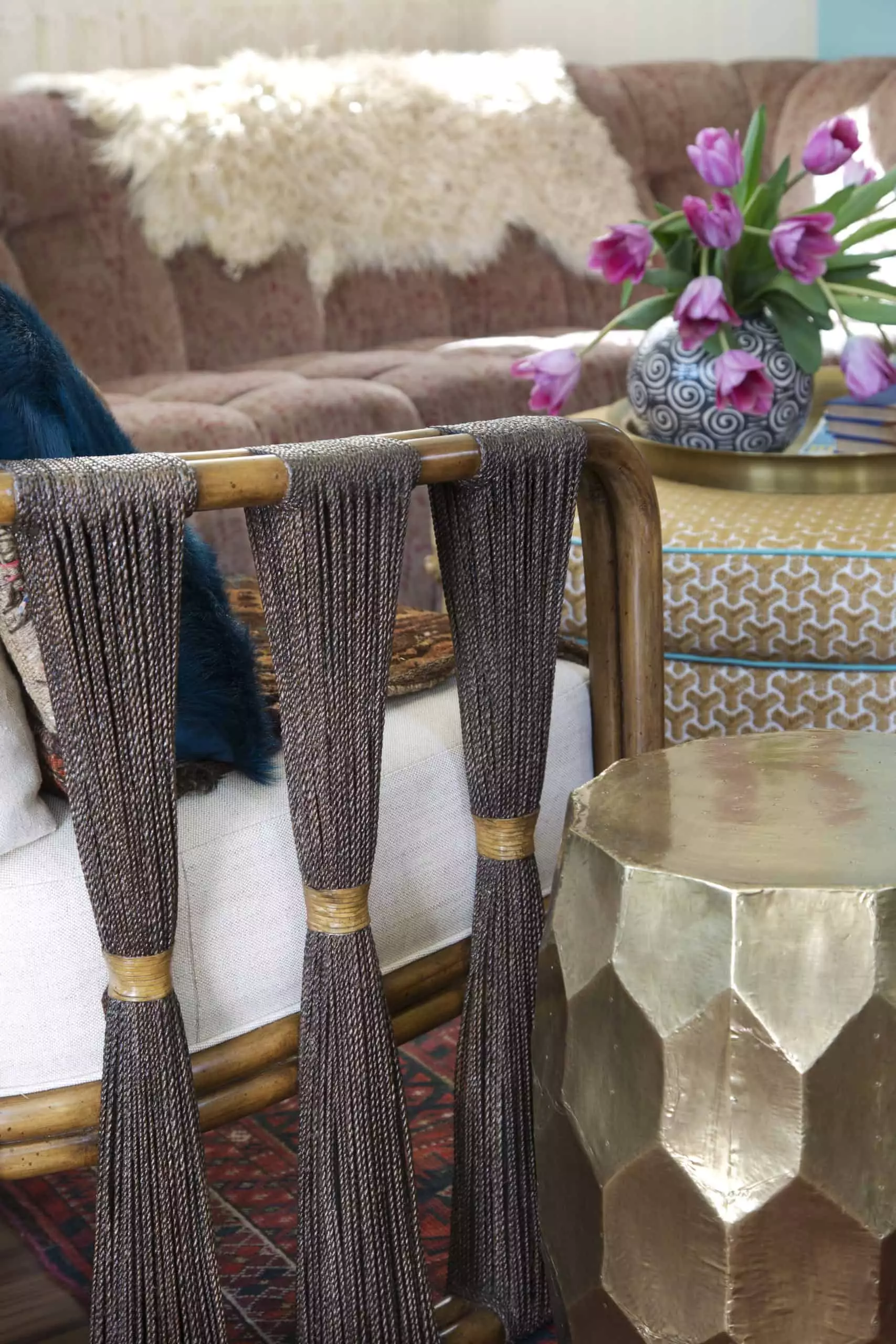 Rattan framed chair with bundled abaca rope and modern metal side table