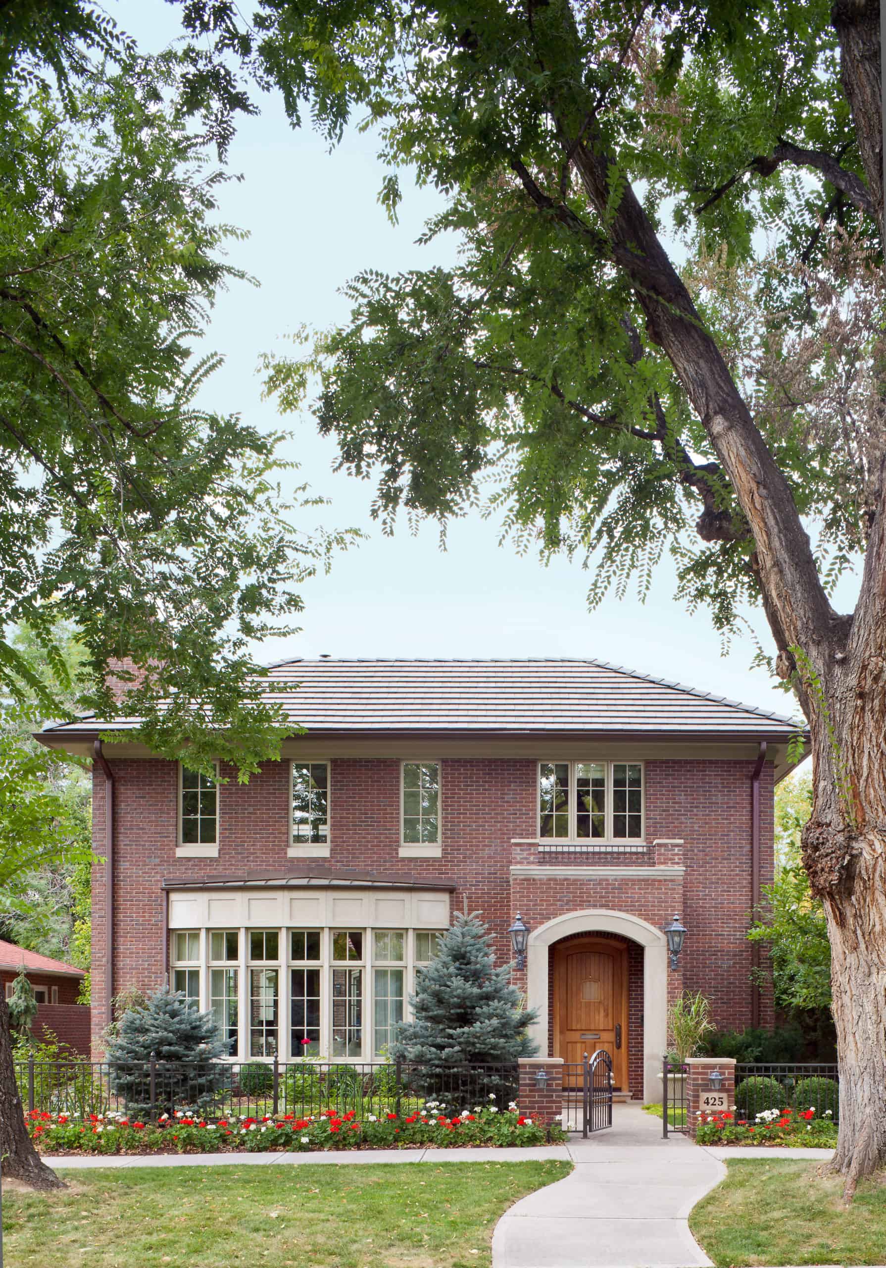 Traditional with a twist two story brick home remodel transformation