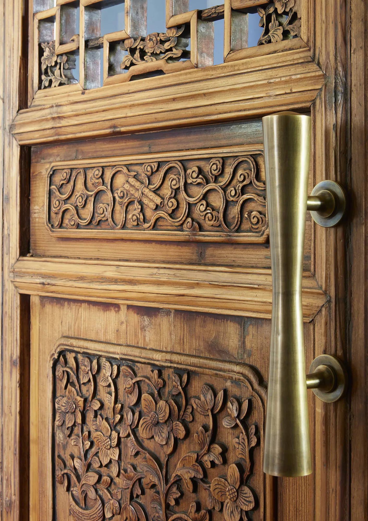 antique wooden door with floral engravings