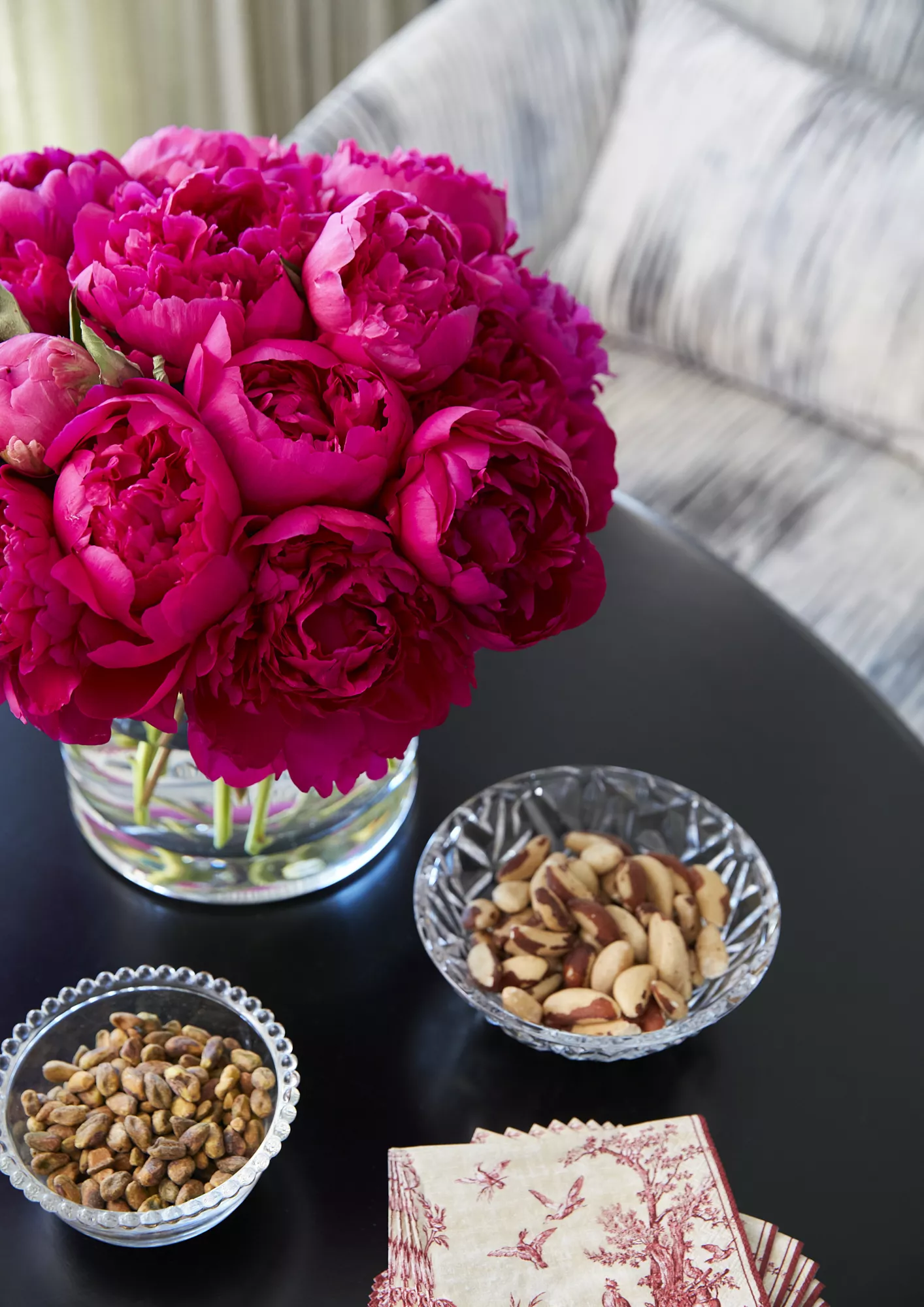 coffee table in sitting area with flowers and food