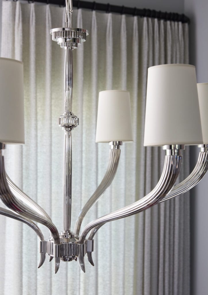 classic silver chandelier in neutral home