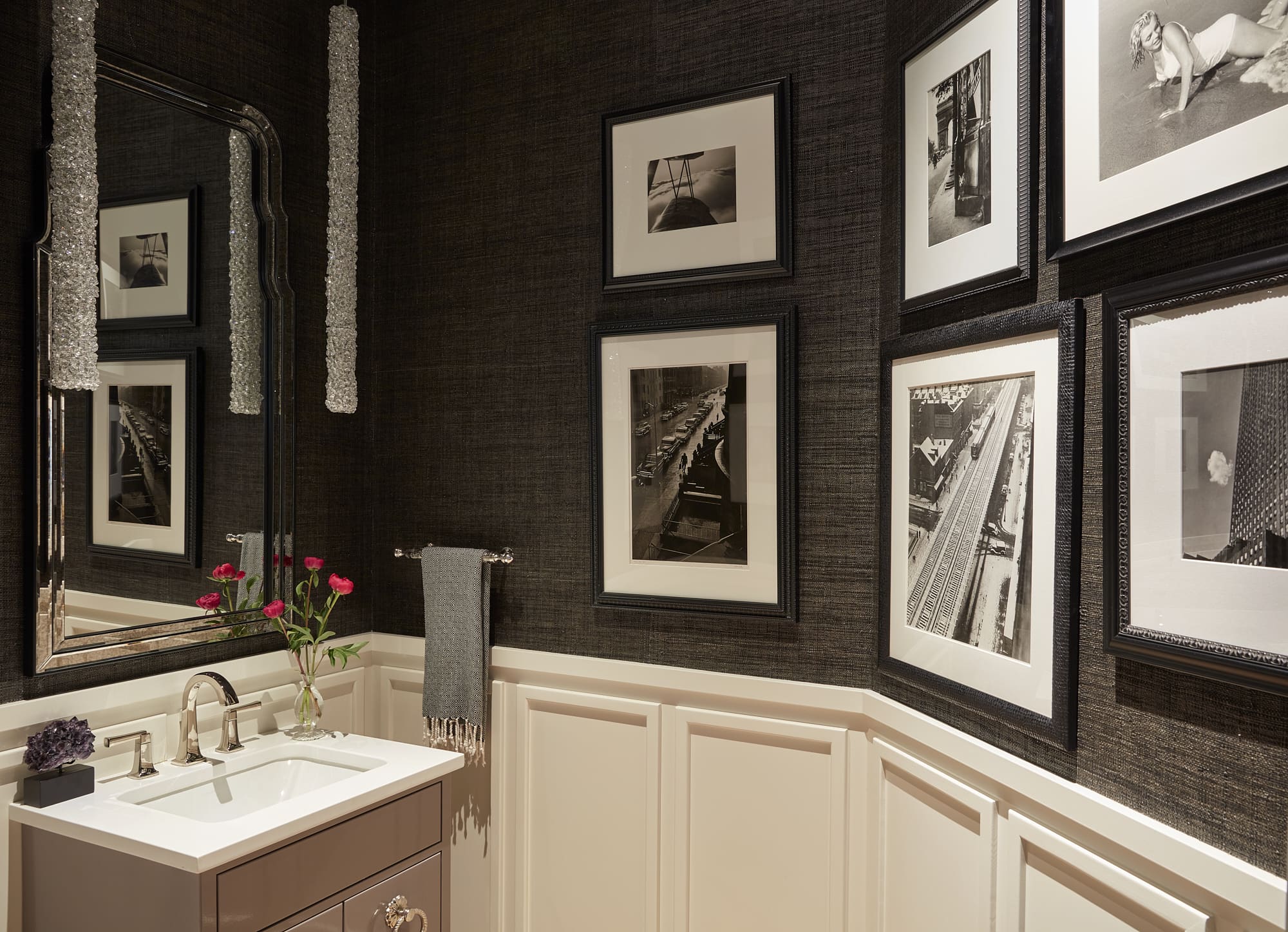 Neutral powder room with black wallpaper