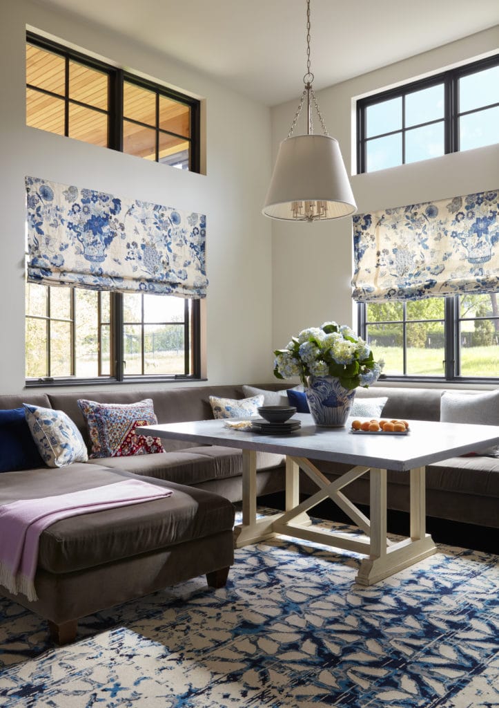 breakfast nook with natural light and blue decor