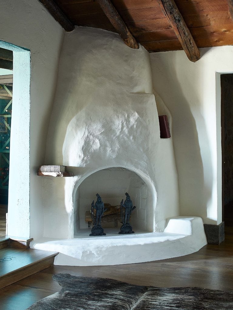 Original, famous white stucco fireplace from Remount Ranch in Wyoming.