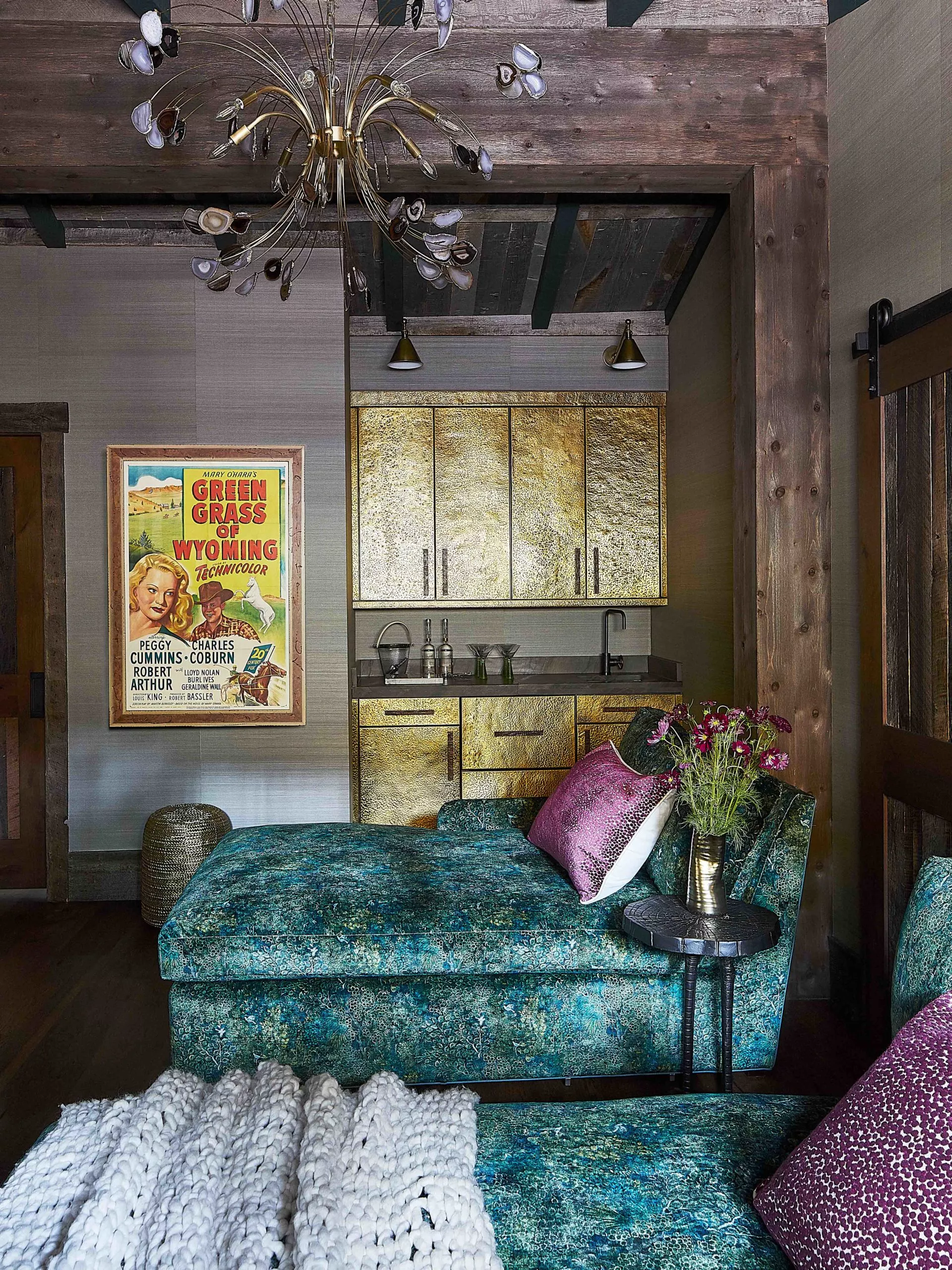 Modern rustic bar with hammered brass cabinetry