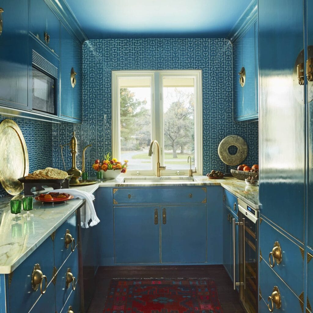 Gorgeous back kitchen renovation with blue cabinets. Butlers pantry.