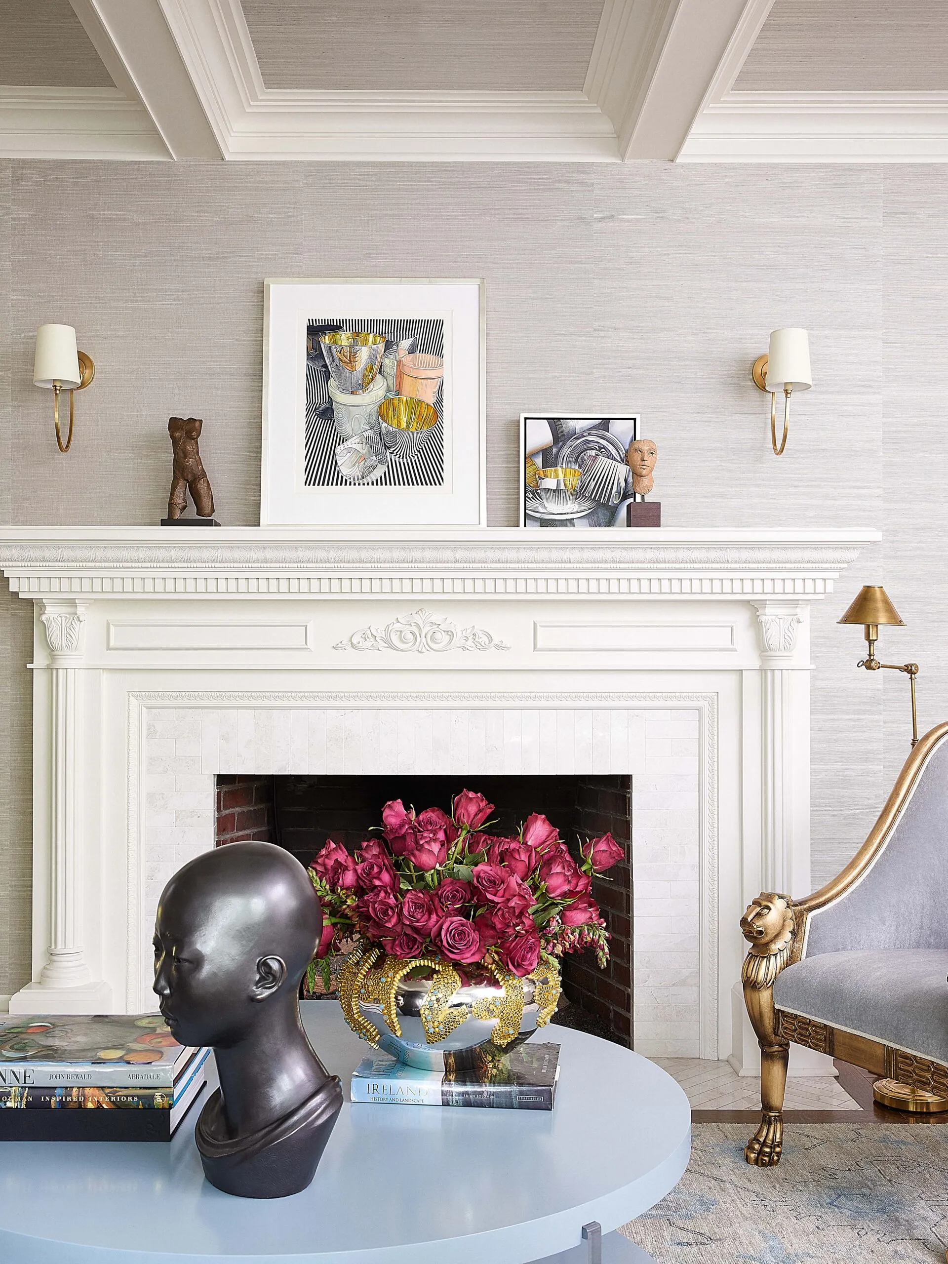 Tudor Revival City Style living room design with wood fireplace mantle and grasscloth walls