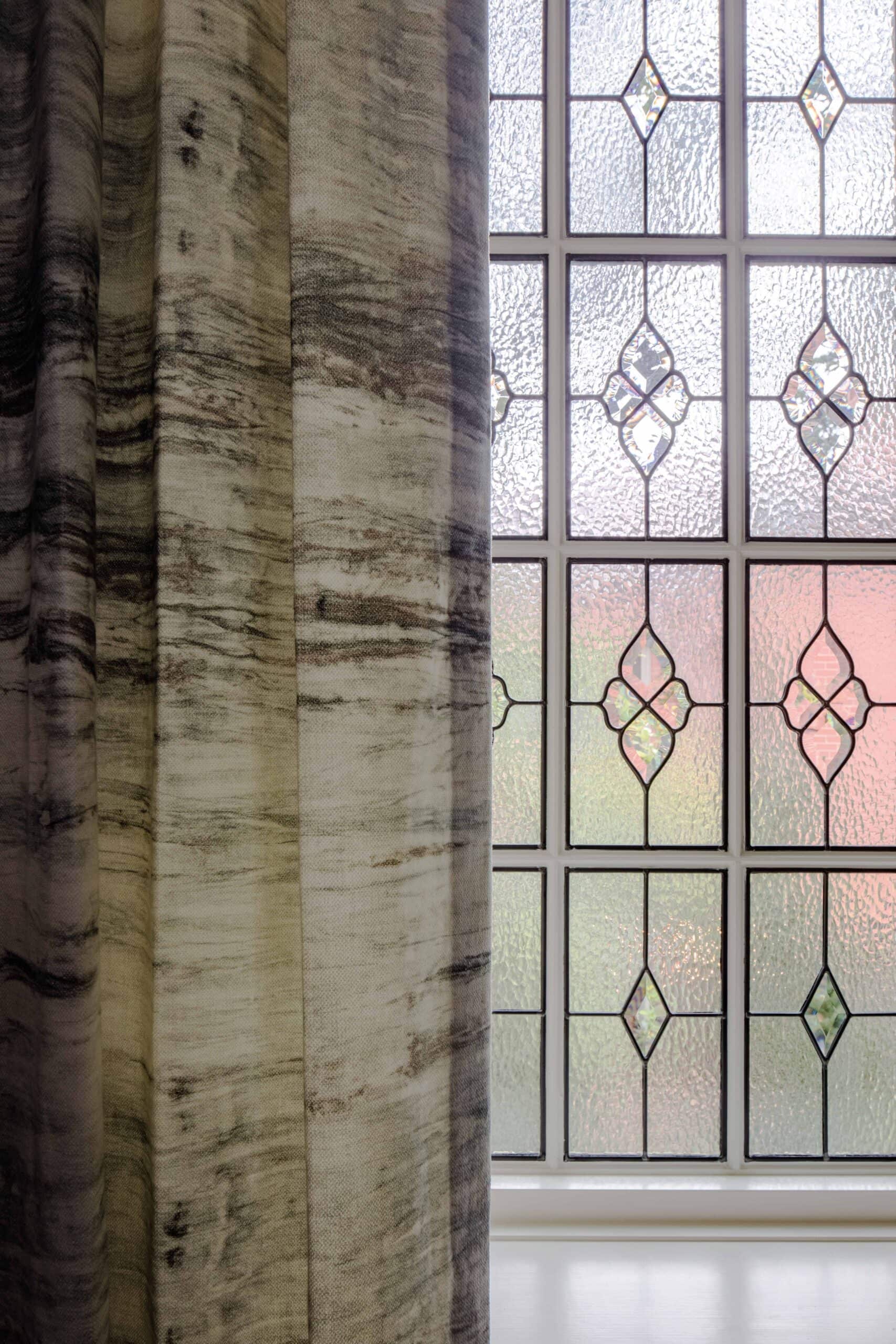 Antique art glass windows and drapery Denver