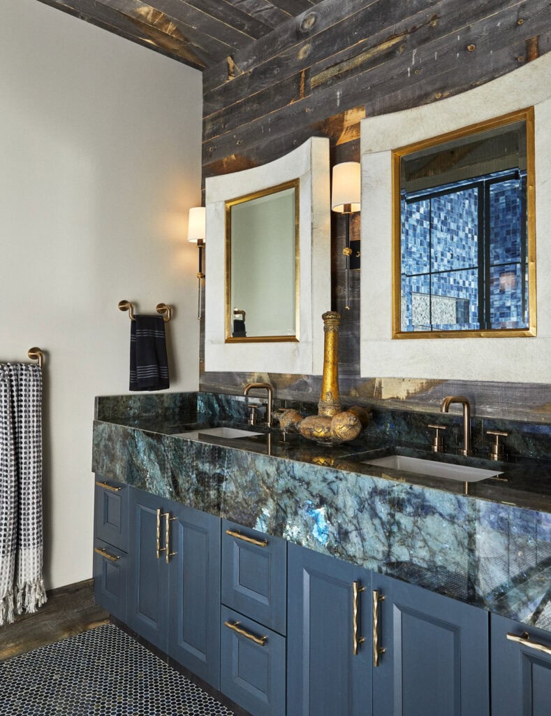 Upscale ranch primary bath vanity with unique bathroom mirrors