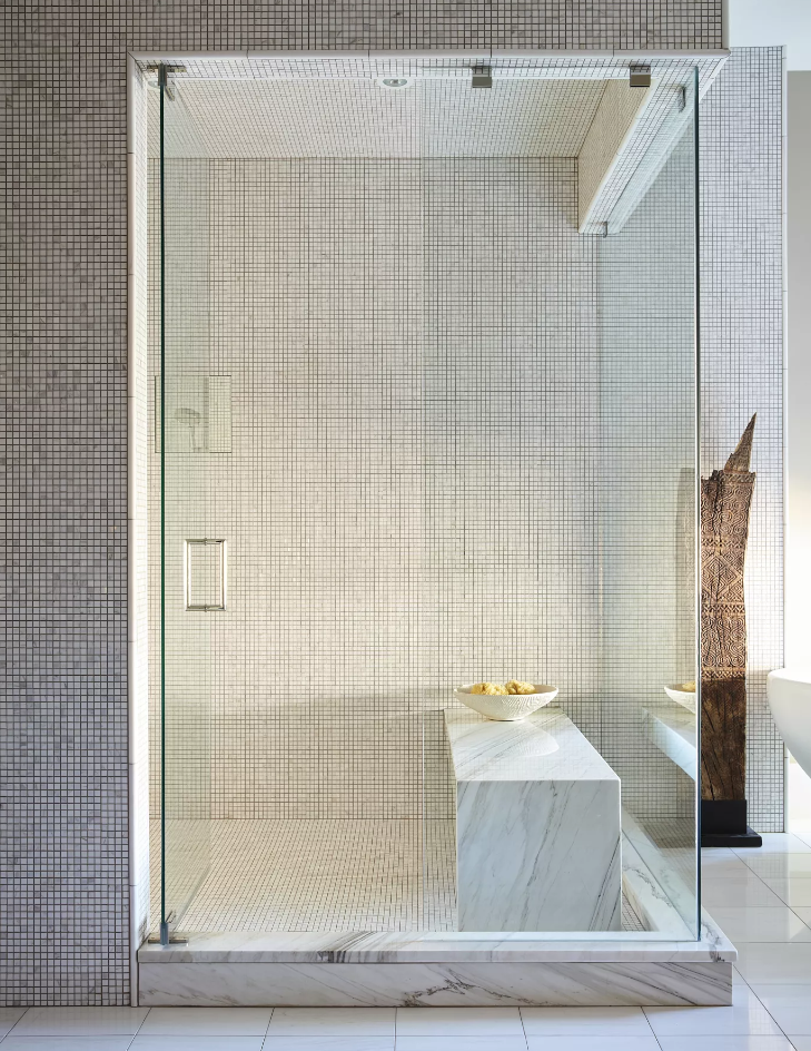 Bathroom renovation with stone bench