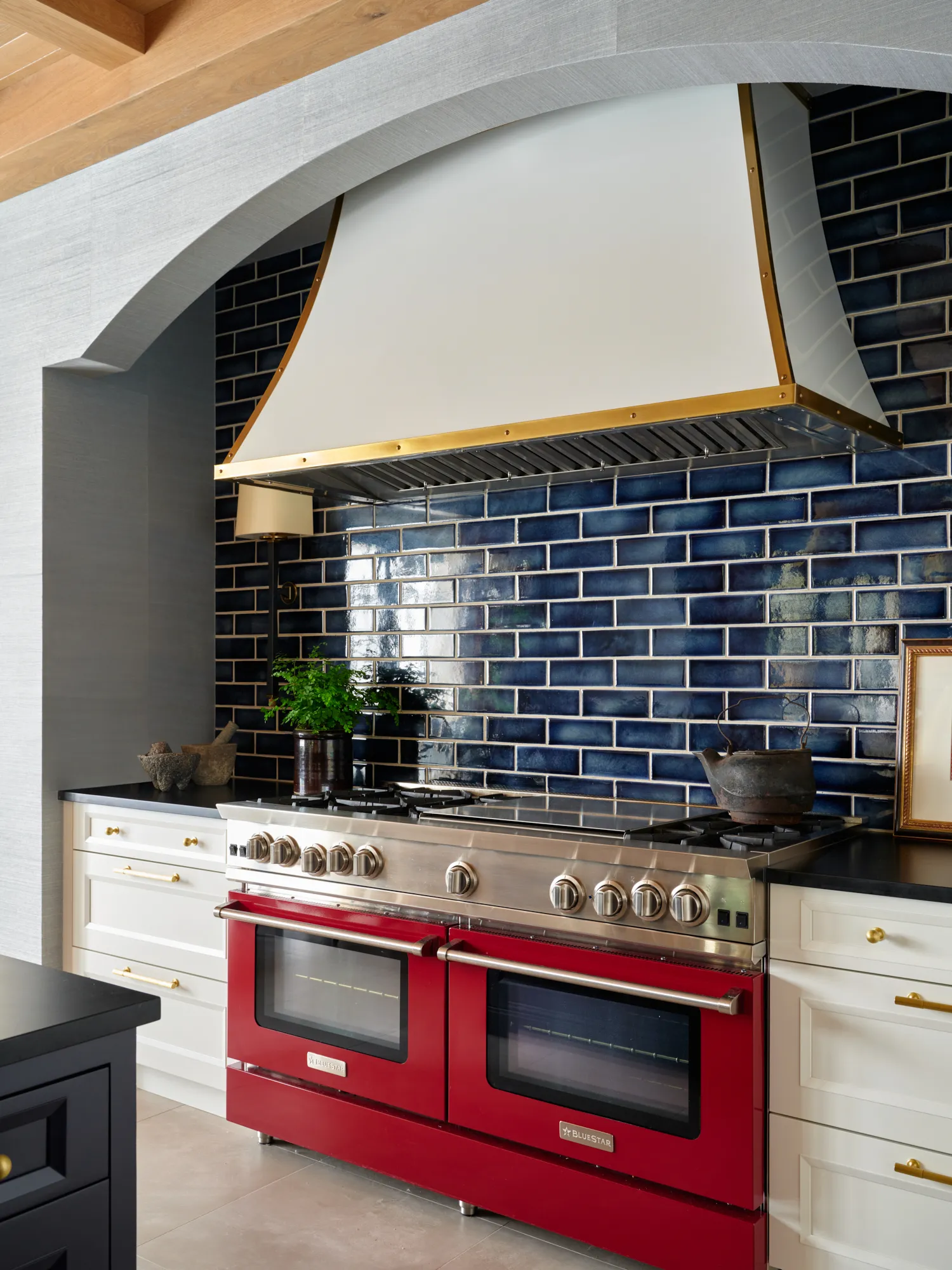 Cherry Hills kitchen BlueStar range red stove tile backsplash