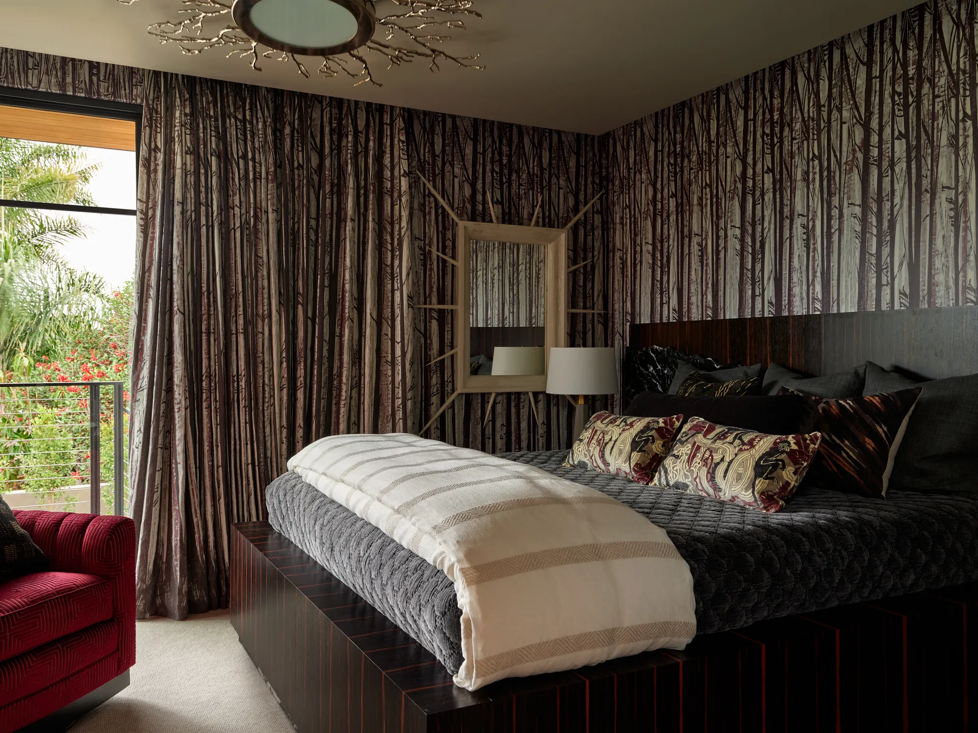 Moody primary bedroom with floor to ceiling drapery in Santa Barbara interior